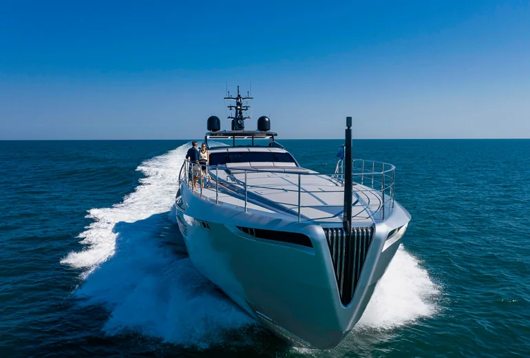 Yacht in a busy summer anchorage