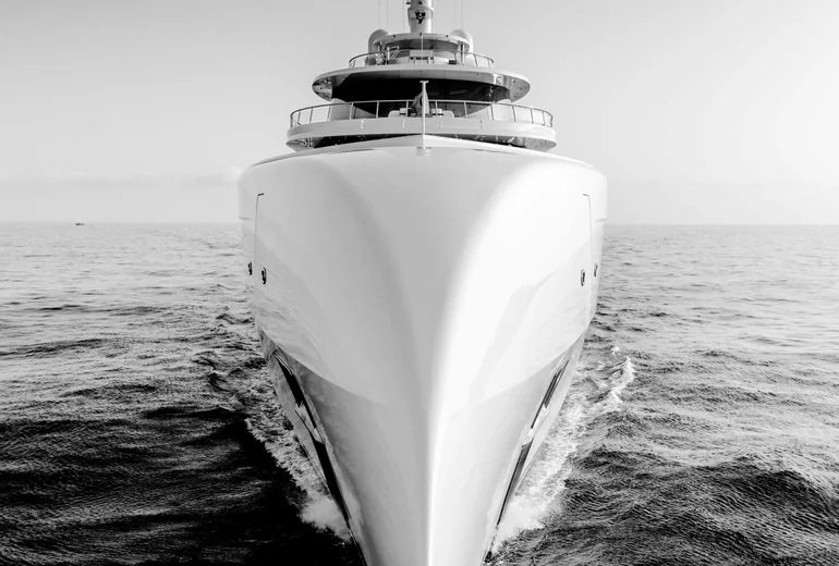 Sailing yacht close-hauled with crew