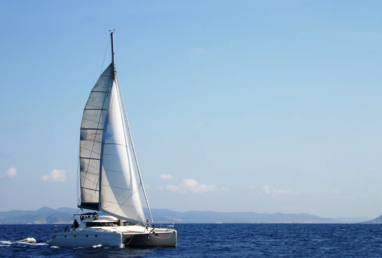 Snorkel and SUP in clear water from yacht