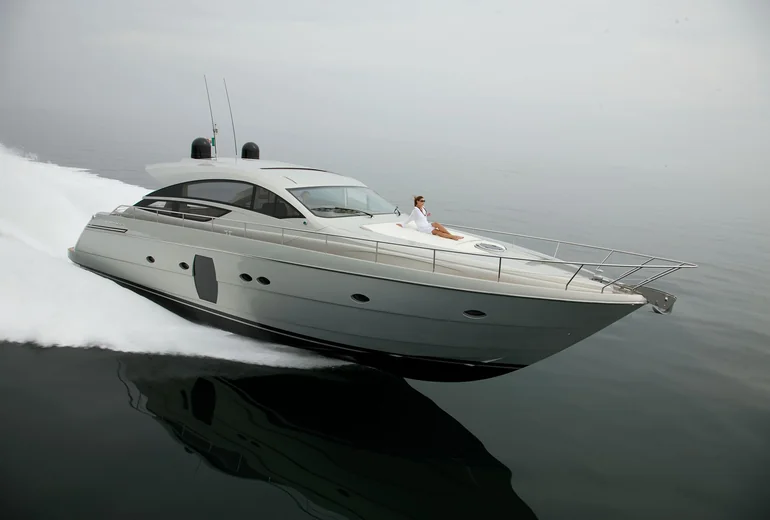 Yacht foredeck with paddleboard and snorkel gear