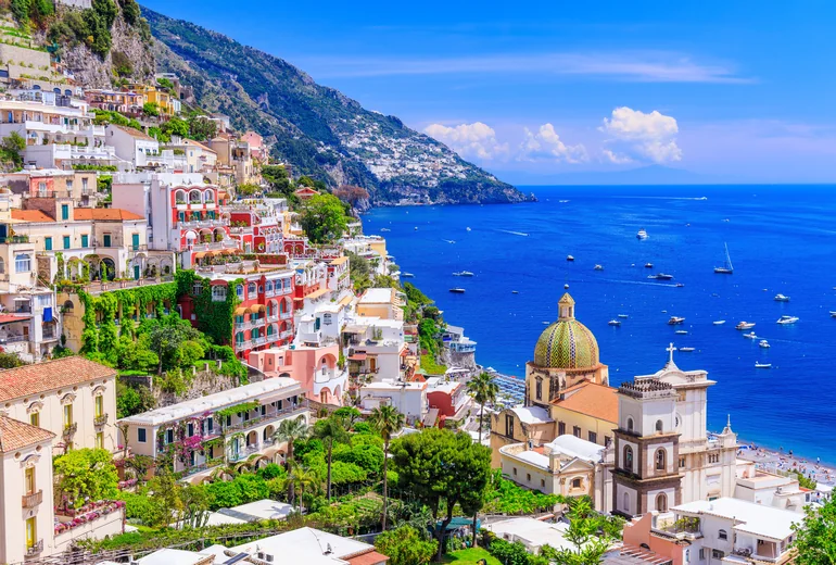Amalfi seen from the sea with the cathedral campanile rising above town