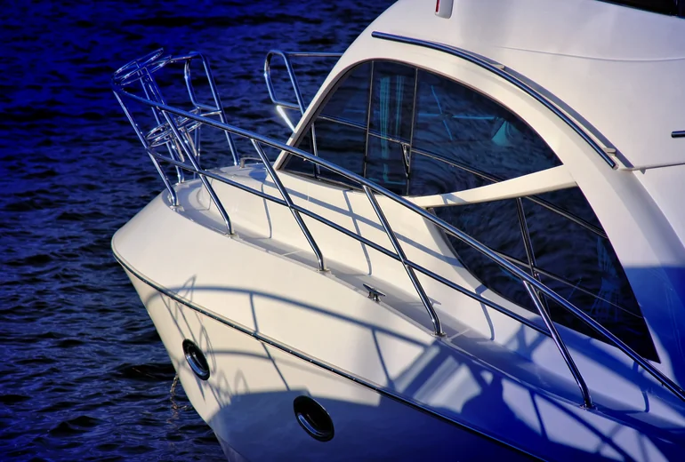 Charter catamaran with guests at anchor