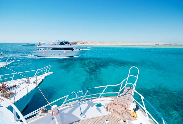 Charter catamaran at anchor in 2026 conditions