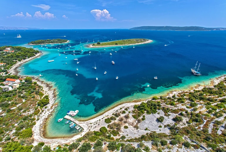 Pakleni archipelago bay with sailing yachts